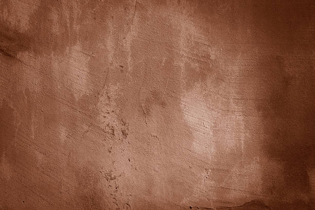 istock Worn brown marble or cracked concrete background 2217002728