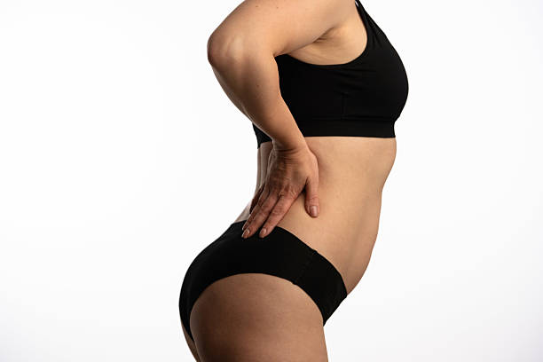 istock Confident Woman in Black Underwear Facing Sideways 2217005686