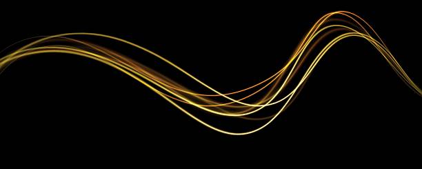 istock Golden glowing shiny spiral speed lines yellow light effect. Curved bright line of light for holiday banners. Glittering wavy trail. 2217006897