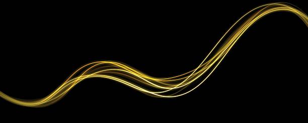 istock Golden glowing shiny spiral speed lines yellow light effect. Curved bright line of light for holiday banners. Glittering wavy trail. 2217008315