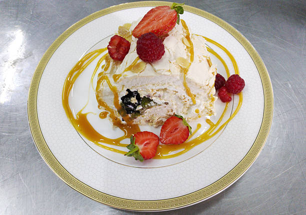 meringue roll with strawberries and raspberries