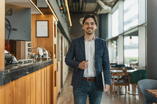 istock Man walking confidently in smart casual attire 2217019920