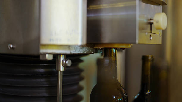 istock Filling wine bottles on a conveyor belt at a winery 2217053944