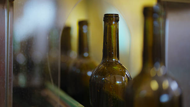 istock Filling wine bottles on a conveyor belt at a winery 2217053983