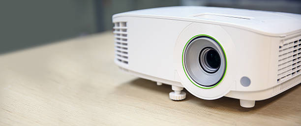 istock Close-up computer projector on table boardroom or meeting room technology equipment of visual or visualizer for presentation interview or classroom meets tool. 2217054098