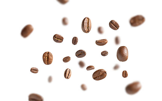 istock Coffee beans levitate. Roasted coffee beans flying on white background with clipping path. Close up image. 2217054206