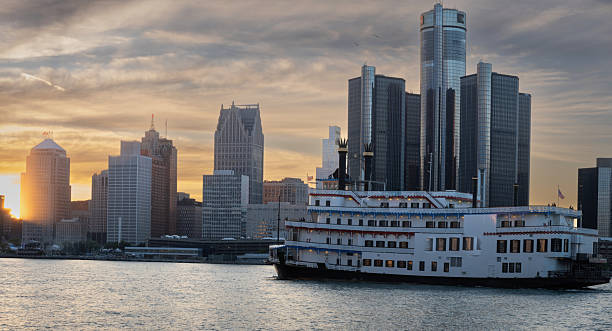 istock Passenger Nautical Vessel on the Detroit River at Sunset 2217056463