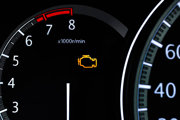 istock Check engine light or warning light closeup, Closeup of a car dashboard 2217068882