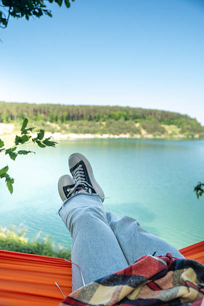 istock Relaxing in a Hammock by the Lake 2217069470