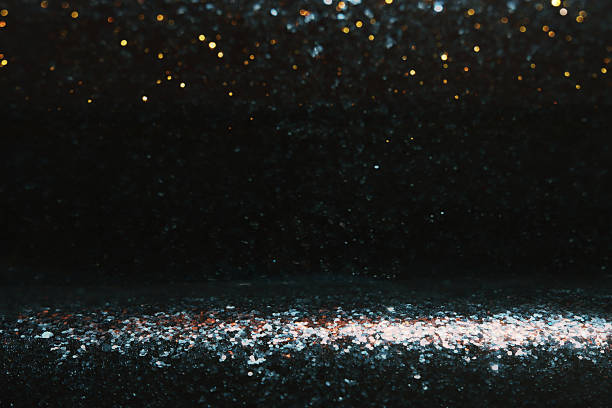 abstract glitter silver and black lights background. de-focused