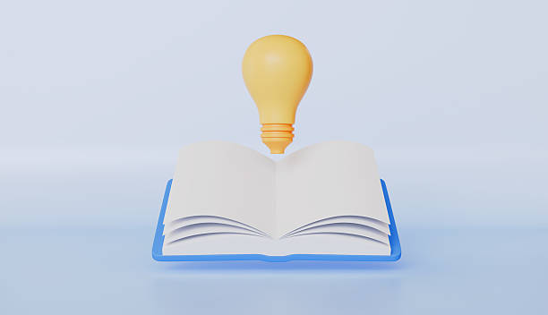 istock Open book with pen, representing education, learning, and the concept of acquiring knowledge 2217083663