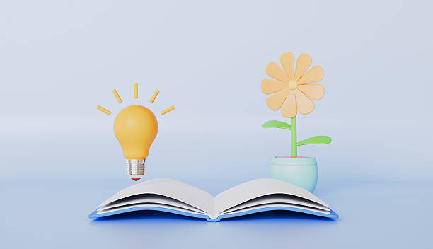 istock An open book with a yellow flower, symbolizing knowledge and the magic of reading 2217083720