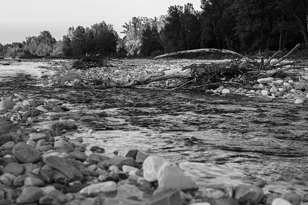 Wide Rocky Riverbed With Clear Flowing Water.