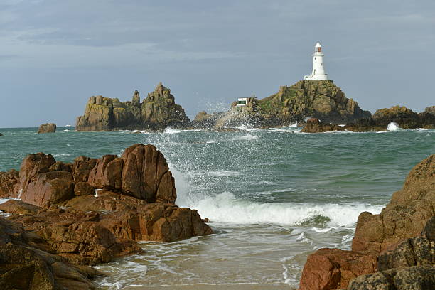 A lighthouse and reef at the end of Spring.
