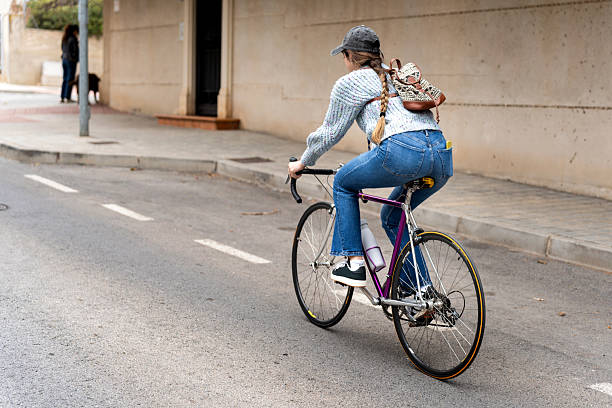 istock University student riding bicycle promoting sustainable urban mobility 2217087787