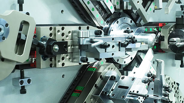 istock An industrial CNC wire bending machine.Including guide rails and clamps and rollers.Automation. 2217088339