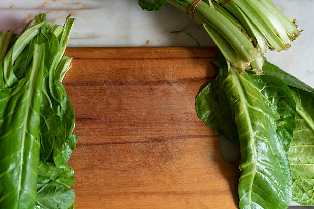 Chard on wooden chopping board