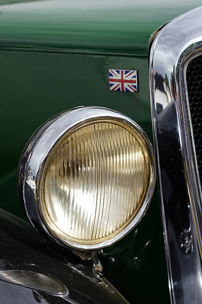 istock Vintage car headlight and British flag 2217098065