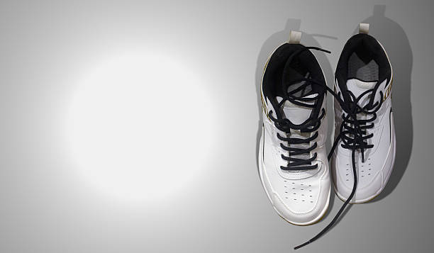 istock White sports shoes isolated on white 2217100004