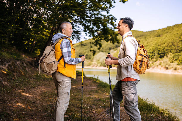 istock Couple standing and talking in forest 2217104503