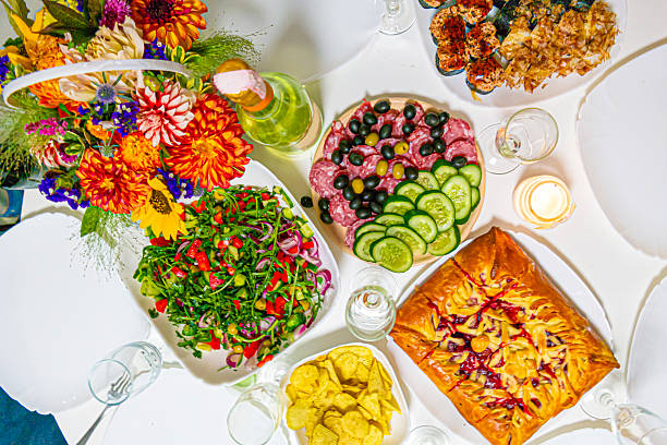 Food Concepts. Appetizing Cherry and Apple Pie With Fruit Jam Placed Along With Vegetable Salad and Meat Plate, Sushi Assortment On White Plate.