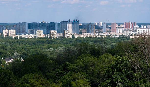 istock Kyiv skyline showcasing urban development with lush greenery in the foreground on a sunny day 2217107381