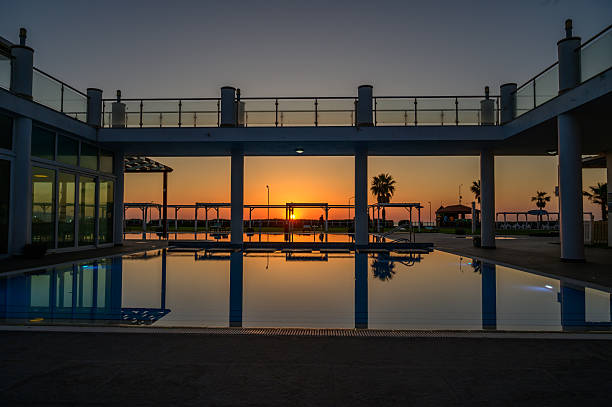istock Sunset Over the Sea and Pool in Cyprus 2217107743