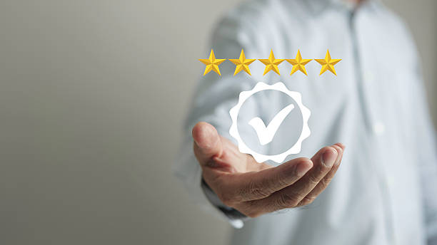 istock Men give five-star certification and certificate of excellent service and verification, warranty, business marketing, quality assurance certification  best warranty, ISO standard. 2217109997