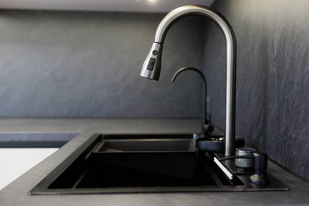 istock Modern kitchen sink with sleek design and functionality, featuring contemporary faucet and stylish 2217111897