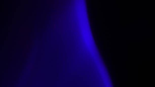 istock Abstract Blue Glare on Dark Background with Shadows 2217112220