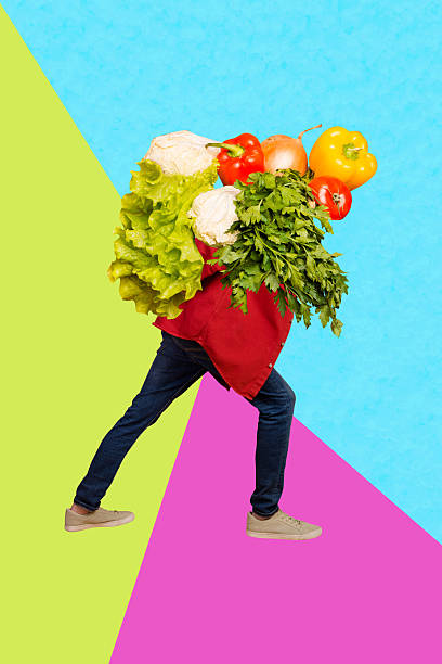 istock Vertical composite artwork collage image picture of mini legs carry walk big fresh vegetables isolated on creative background 2217113469