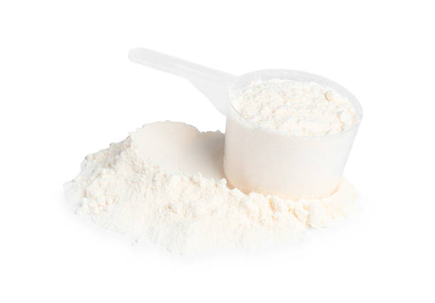 istock Protein powder and scoop isolated on white 2217115788