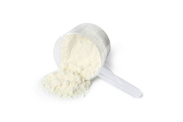 istock Protein powder and scoop isolated on white 2217115848