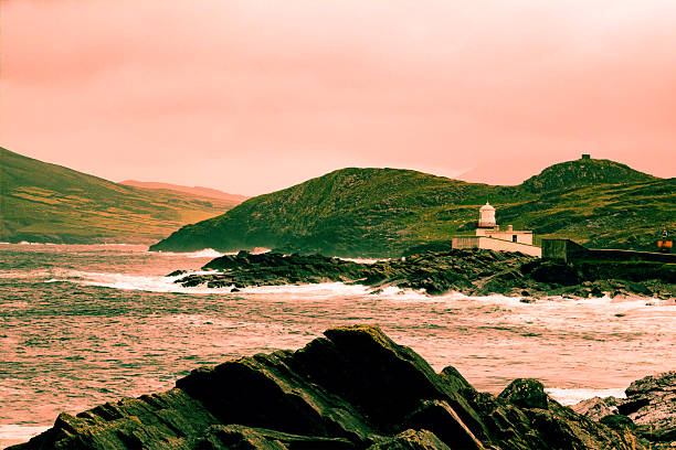 Side view of Valentia Island lighthouse and Pilots Lookout Post in the distance.