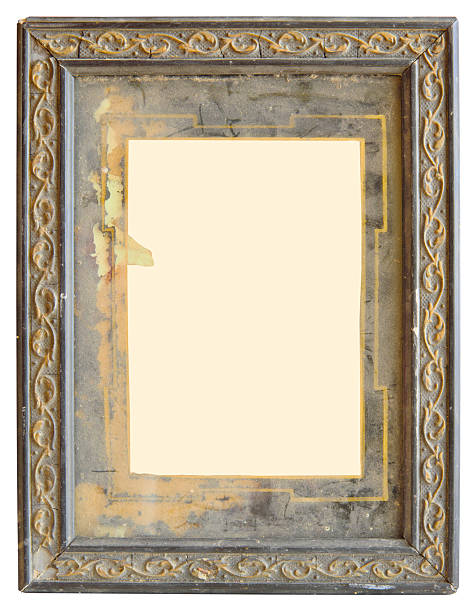 istock Vintage grungy empty picture frame.Very dusty object,est. 1910.Free space for your pics,paintings or copy.Isolated on white. 2217118281