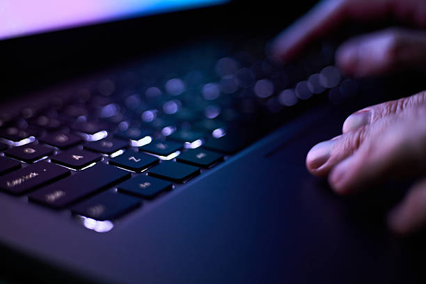 istock Male hands are typing on a laptop keyboard. 2217122977