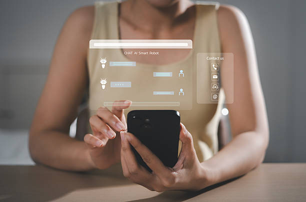 istock AI Chatbot conversation assistant. Person using online customer service with chatbot to get support. AI automatic answering machine. Artificial intelligence, customer support center, 2217123554