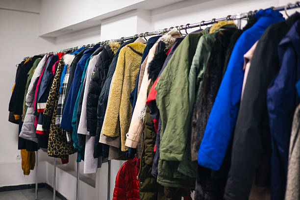 istock Clothing on hangers in the second-hand, sustainable, zero waste wardrobe. 2217125613