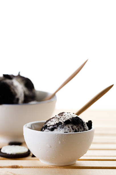 Cookies and cream ice cream in a white bowl.