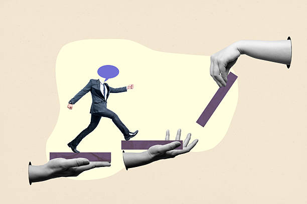 istock Human hand holding a step for a businessman with a speech bubble walking on it with a colored background. Concept of business strategy. Collage art 2217127269