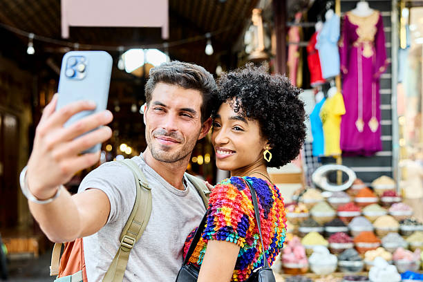 istock Happy couple taking selfie through smart phone 2217128413