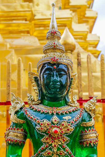 istock Buddha Emerald green statue in a Buddhist temple Wat in Thailand 2217130497