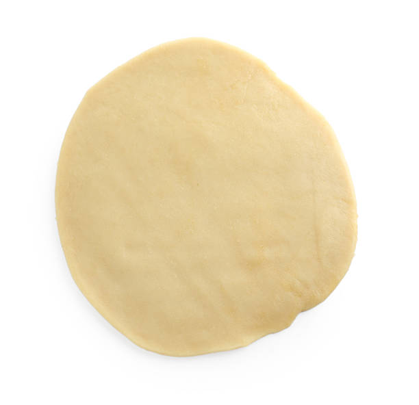 istock Cooking homemade pie. Raw dough isolated on white, top view 2217130773