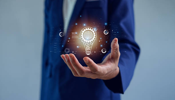 istock Human hand holding light bulb to illuminate. Innovation through ideas and inspiration ideas. idea of creativity and inspiration concept of sustainable business development. 2217133092