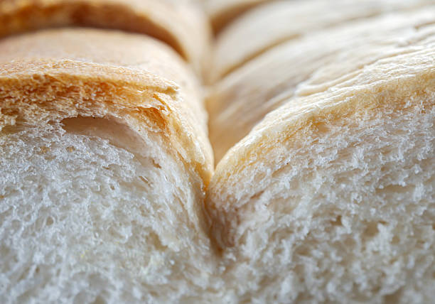 Fresh, soft and fragrant bread with brown edges macro food