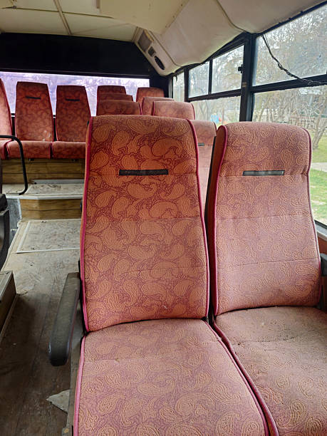istock Interior of an old, disused, scrapped bus 2217136763