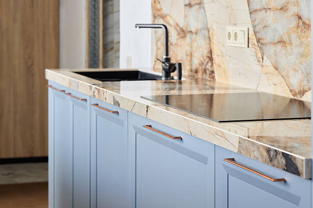 istock A Modern Kitchen Featuring a Sleek and Stylish Marble Countertop Accompanied by Blue Cabinets 2217137041