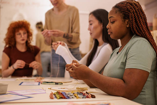 istock Embroidery Class in Session with Teacher and Students 2217137988