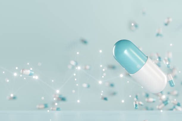 istock Floating blue and white capsule pill surrounded by sparkling particles on a light blue background. 3d rendering 2217138638
