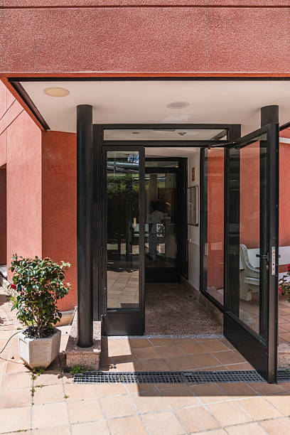 istock Modern nursing home entrance with open doors welcoming visitors 2217141983